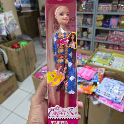 Muñeca plástica en caja 11.5"